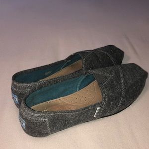 TOMS grey slip ons